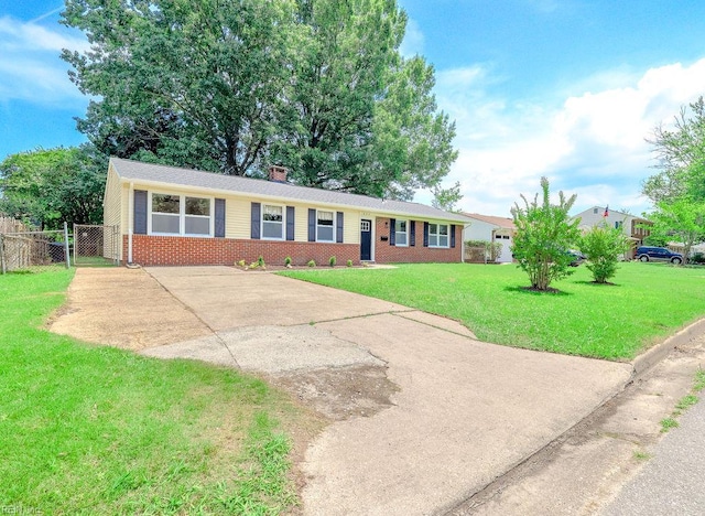 552 Boxwood Ln, Virginia Beach, VA 23452 - ranch-style home featuring brick siding, a chimney, concrete driveway, and a gate