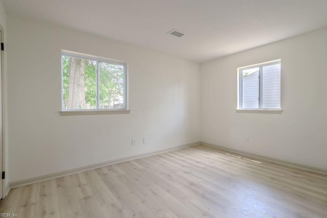 552 Boxwood Ln, Virginia Beach, VA 23452 - empty room with plenty of natural light and wood finished floors