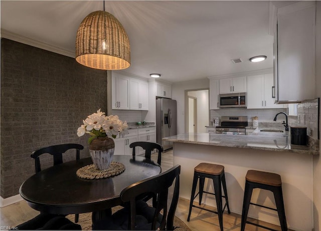 552 Boxwood Ln, Virginia Beach, VA 23452 - dining space featuring light wood finished floors