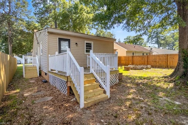 11 Alpine St, Newport News, VA 23606 - rear view of property featuring a wooden deck and crawl space