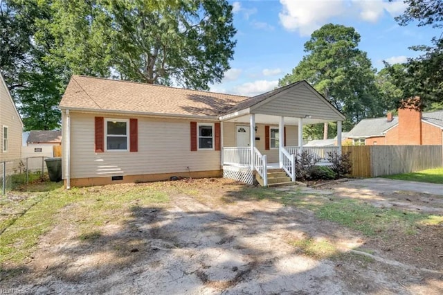 11 Alpine St, Newport News, VA 23606 - view of front of house with covered porch, crawl space, and a shingled roof