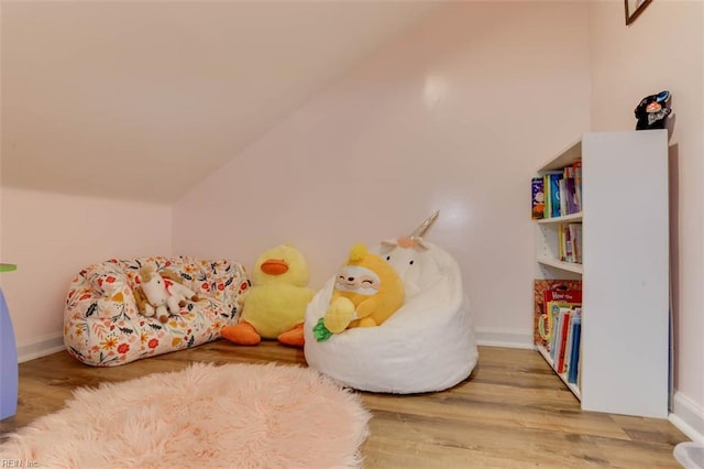 408 Lodge Cv, Chesapeake, VA 23323 - playroom with vaulted ceiling and wood finished floors