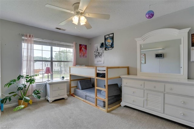 408 Lodge Cv, Chesapeake, VA 23323 - bedroom with a textured ceiling, light colored carpet, and a ceiling fan