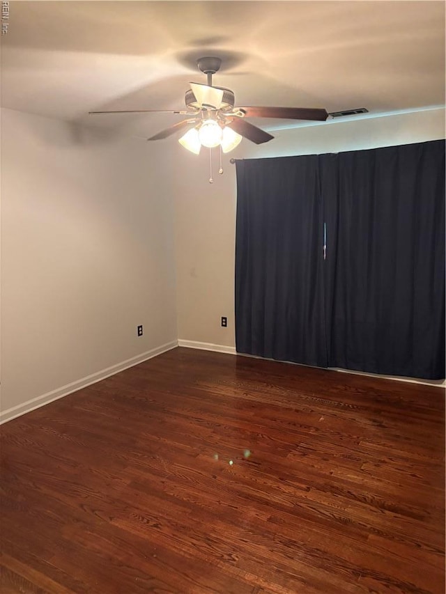 1122 Gatling Dr, Hampton, VA 23666 - empty room with dark wood finished floors and a ceiling fan
