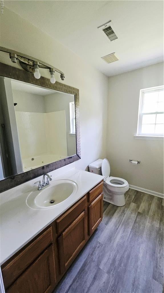 275 Jonathans Way, Suffolk, VA 23434 - bathroom featuring vanity, wood finished floors, and a shower