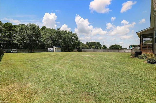 114 Climbing Vine Run, Elizabeth City, NC 27909 - fenced backyard with a storage unit and stairway
