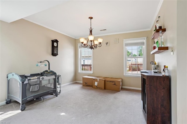 719 Kensington Dr, Newport News, VA 23602 - dining space with ornamental molding, a chandelier, and light colored carpet