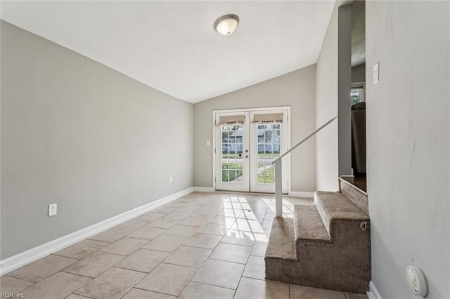 149 Ransone St, Hampton, VA 23669 - unfurnished living room with french doors, lofted ceiling, stairway, and light tile patterned floors