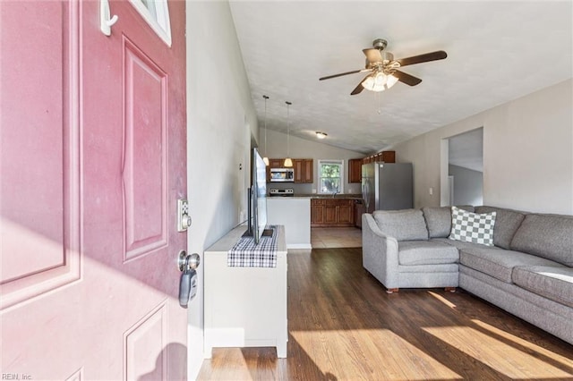 149 Ransone St, Hampton, VA 23669 - living room with wood finished floors, a ceiling fan, and vaulted ceiling