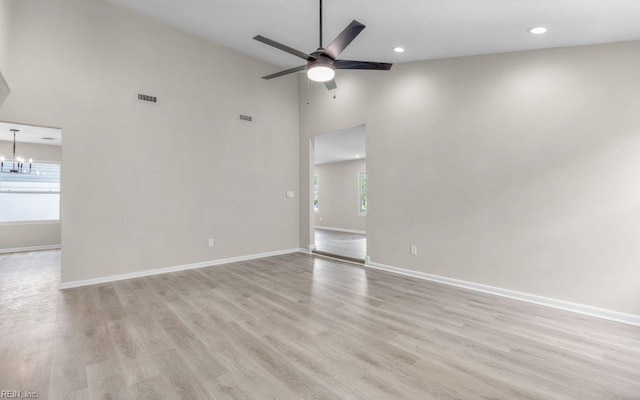 3549 Dandelion Cres, Virginia Beach, VA 23453 - unfurnished living room featuring a chandelier, high vaulted ceiling, light wood-type flooring, ceiling fan, and recessed lighting