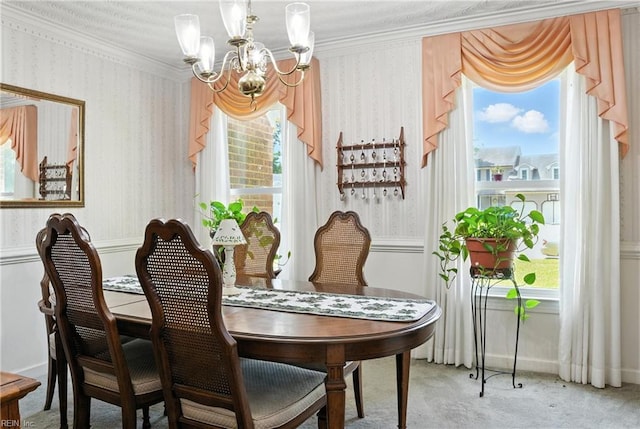 3805 Fleet Ct, Portsmouth, VA 23703 - dining room with a chandelier, wallpapered walls, carpet flooring, and crown molding