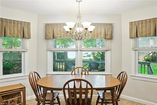 3805 Fleet Ct, Portsmouth, VA 23703 - dining room with a chandelier and baseboards