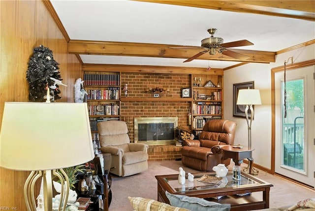 3805 Fleet Ct, Portsmouth, VA 23703 - living room featuring carpet floors, ceiling fan, beam ceiling, a brick fireplace, and ornamental molding