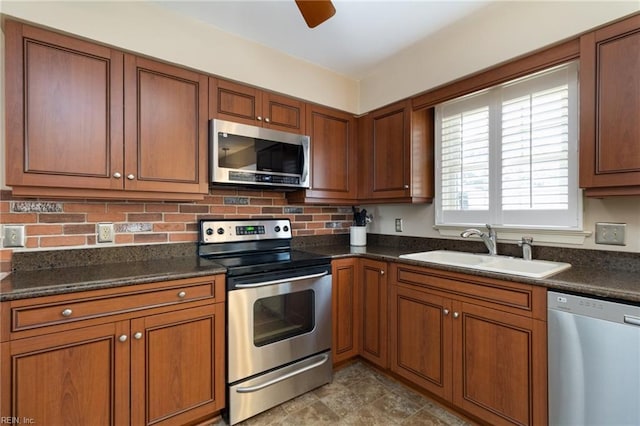 2513 Torrey Pl, Virginia Beach, VA 23454 - kitchen with appliances with stainless steel finishes, decorative backsplash, and brown cabinets