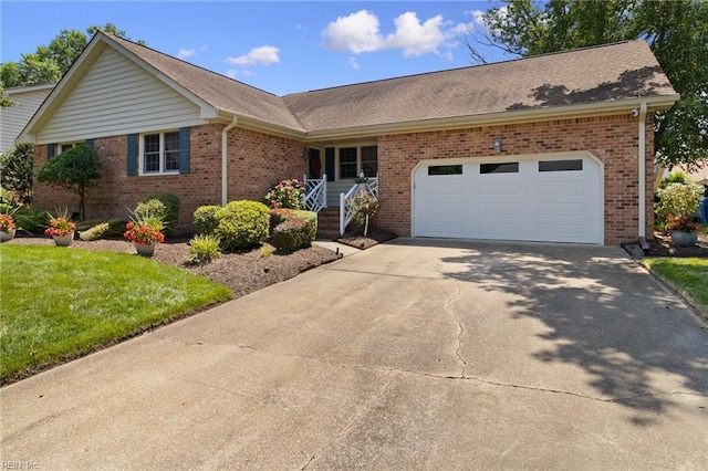 2513 Torrey Pl, Virginia Beach, VA 23454 - single story home with brick siding, driveway, a garage, and a front lawn