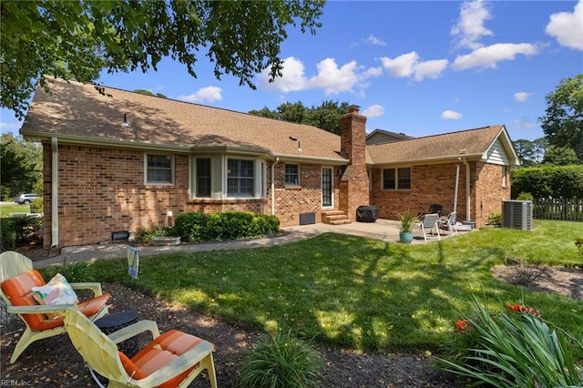 2513 Torrey Pl, Virginia Beach, VA 23454 - rear view of house with entry steps, a patio area, brick siding, and a chimney