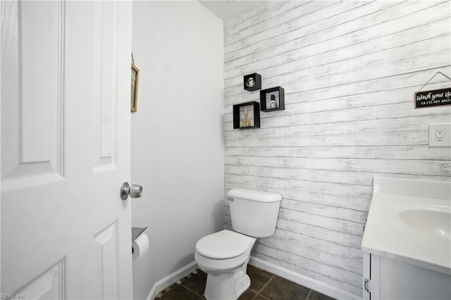 447 Seahorse Run, Chesapeake, VA 23320 - bathroom with wood walls, vanity, and tile patterned floors