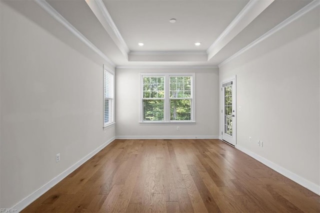 6428 Yarmouth Run, Williamsburg, VA 23188 - empty room featuring a raised ceiling, crown molding, hardwood / wood-style floors, and recessed lighting