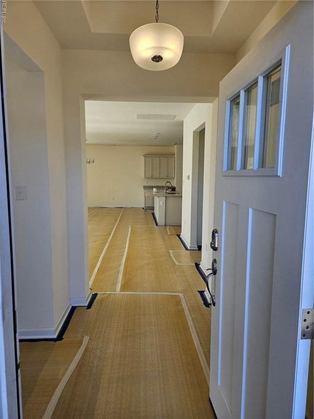 208 St Pauls Ave Unit 30-3, Smithfield, VA 23430 - hall featuring baseboards and a sink