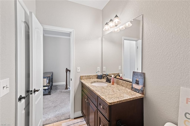 7546 Villa Ct Unit 37, Gloucester Point, VA 23062 - bathroom featuring vanity and a textured wall