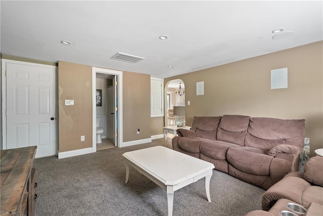 6019 Tabiatha Ln, Lanexa, VA 23089 - living area featuring arched walkways, carpet flooring, and recessed lighting