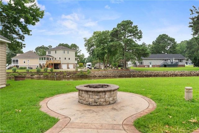 6019 Tabiatha Ln, Lanexa, VA 23089 - view of grassy yard featuring an outdoor fire pit and a water view
