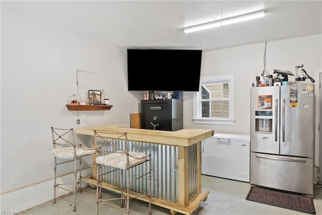 6019 Tabiatha Ln, Lanexa, VA 23089 - kitchen with stainless steel fridge with ice dispenser, concrete floors, and wood counters