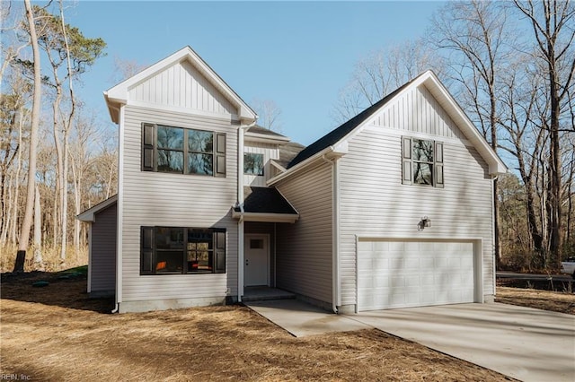 120 Rowland Creek Rd, Moyock, NC 27958 - view of front of property featuring a garage, board and batten siding, and concrete driveway