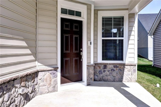 6371 Yarmouth Run, Williamsburg, VA 23188 - doorway to property with stone siding and covered porch