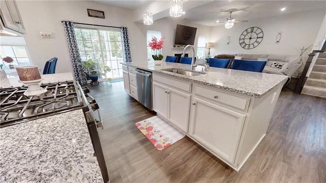 9809 Coral Bells Ct, Toano, VA 23168 - kitchen featuring appliances with stainless steel finishes, dark wood-type flooring, a ceiling fan, white cabinetry, and open floor plan