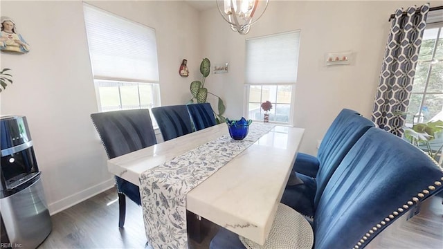 9809 Coral Bells Ct, Toano, VA 23168 - dining area featuring wood finished floors and a chandelier