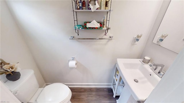 9809 Coral Bells Ct, Toano, VA 23168 - bathroom with wood finished floors and vanity