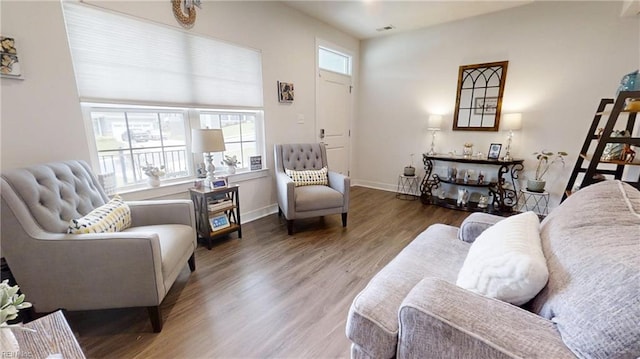 9809 Coral Bells Ct, Toano, VA 23168 - living room featuring wood finished floors and baseboards