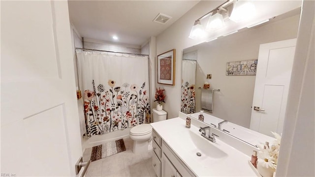 9809 Coral Bells Ct, Toano, VA 23168 - bathroom with vanity and tile patterned floors