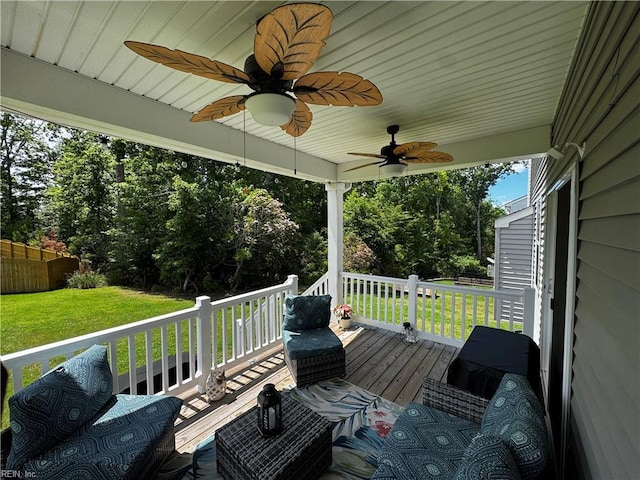 9809 Coral Bells Ct, Toano, VA 23168 - wooden terrace with a yard, ceiling fan, and view of scattered trees