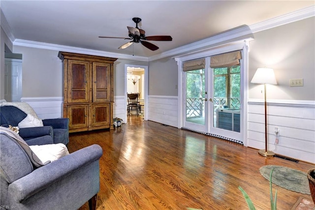 102 Whitehall Ct, Williamsburg, VA 23188 - living area with wainscoting, a ceiling fan, crown molding, wood finished floors, and french doors