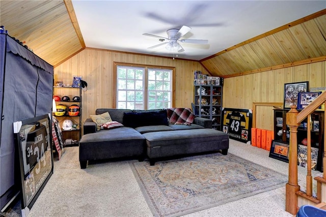 102 Whitehall Ct, Williamsburg, VA 23188 - living area with ceiling fan, wood walls, carpet floors, and vaulted ceiling