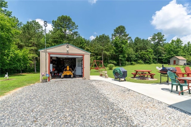 2501 Clancie Rd, Shacklefords, VA 23156 - detached garage with view of scattered trees