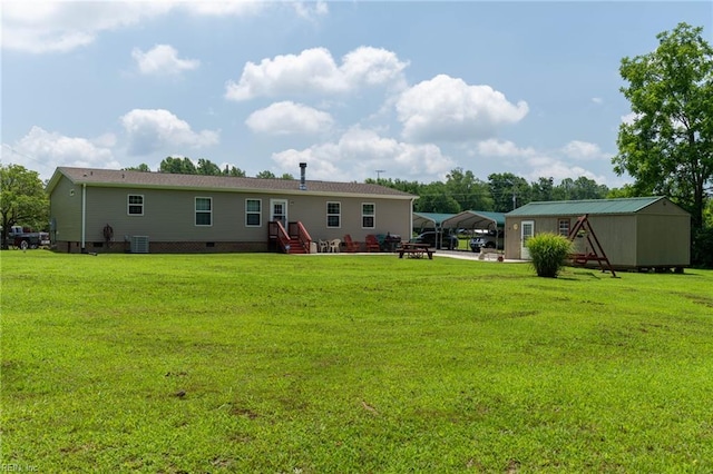 2501 Clancie Rd, Shacklefords, VA 23156 - back of house with crawl space, a carport, and a yard