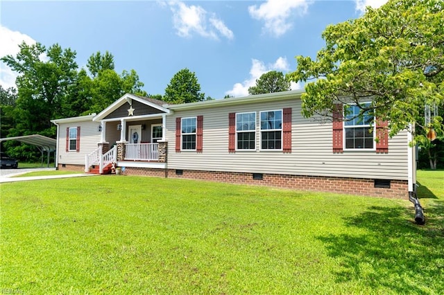 2501 Clancie Rd, Shacklefords, VA 23156 - manufactured / mobile home featuring crawl space, a porch, a front lawn, a detached carport, and concrete driveway