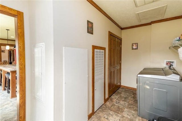 2501 Clancie Rd, Shacklefords, VA 23156 - laundry area featuring a heating unit, crown molding, washer and clothes dryer, and stone finish floors