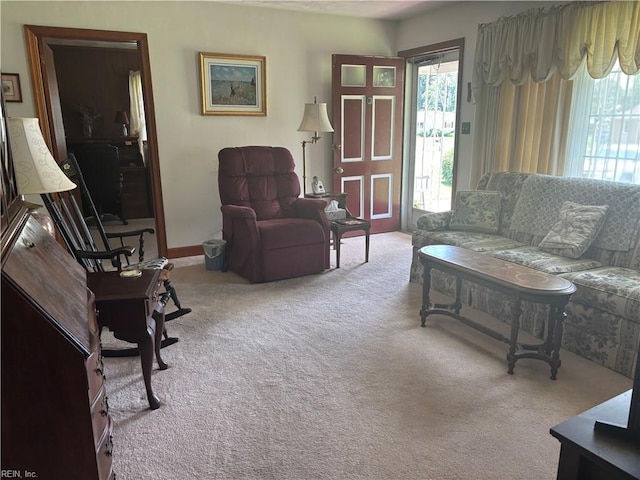 906 Rebecca St, Franklin, VA 23851 - carpeted living room with baseboards