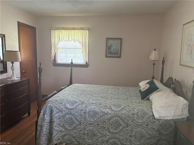 906 Rebecca St, Franklin, VA 23851 - bedroom with dark wood-style flooring
