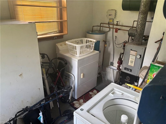 906 Rebecca St, Franklin, VA 23851 - laundry area with washer / dryer and water heater