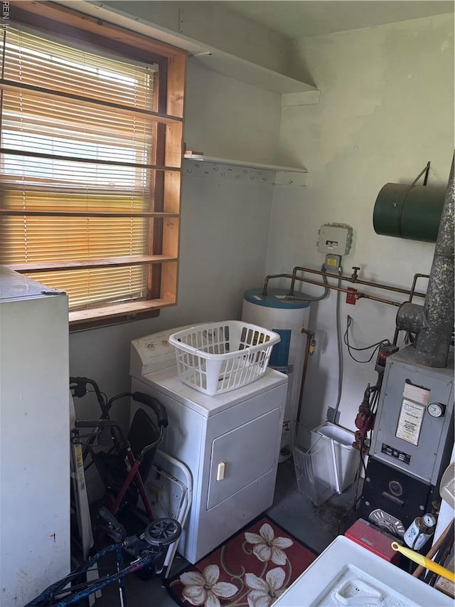 906 Rebecca St, Franklin, VA 23851 - laundry room featuring washer / dryer and electric water heater