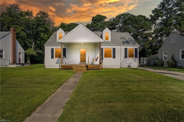 6 Albemarle St, Portsmouth, VA 23707 - view of front facade with a porch, a yard, and crawl space