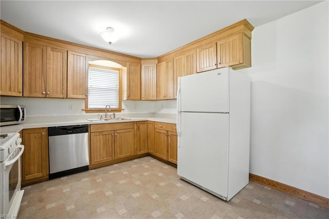 6 Albemarle St, Portsmouth, VA 23707 - kitchen featuring stainless steel appliances, light floors, and light countertops
