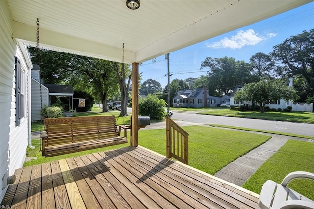6 Albemarle St, Portsmouth, VA 23707 - wooden porch featuring a lawn and a residential view