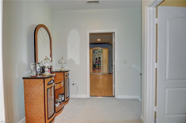 1132 Broadholme Pl Unit 642, Virginia Beach, VA 23455 - corridor with baseboards and carpet