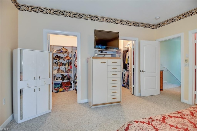 1132 Broadholme Pl Unit 642, Virginia Beach, VA 23455 - bedroom with a walk in closet, a closet, and light colored carpet